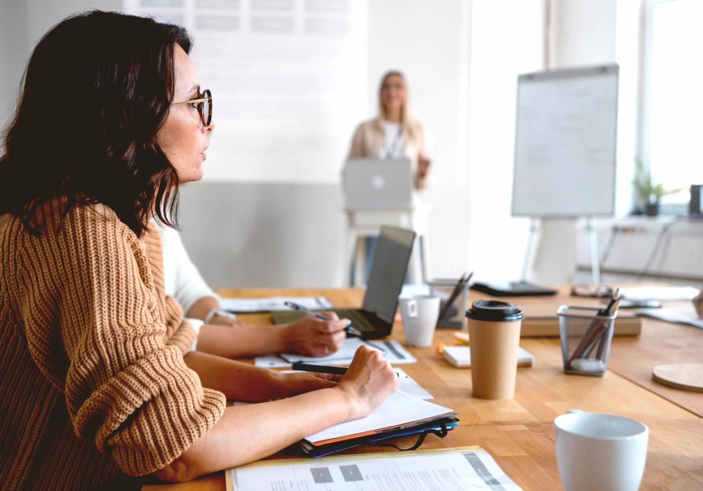 Modern office space with financial professionals working collaboratively