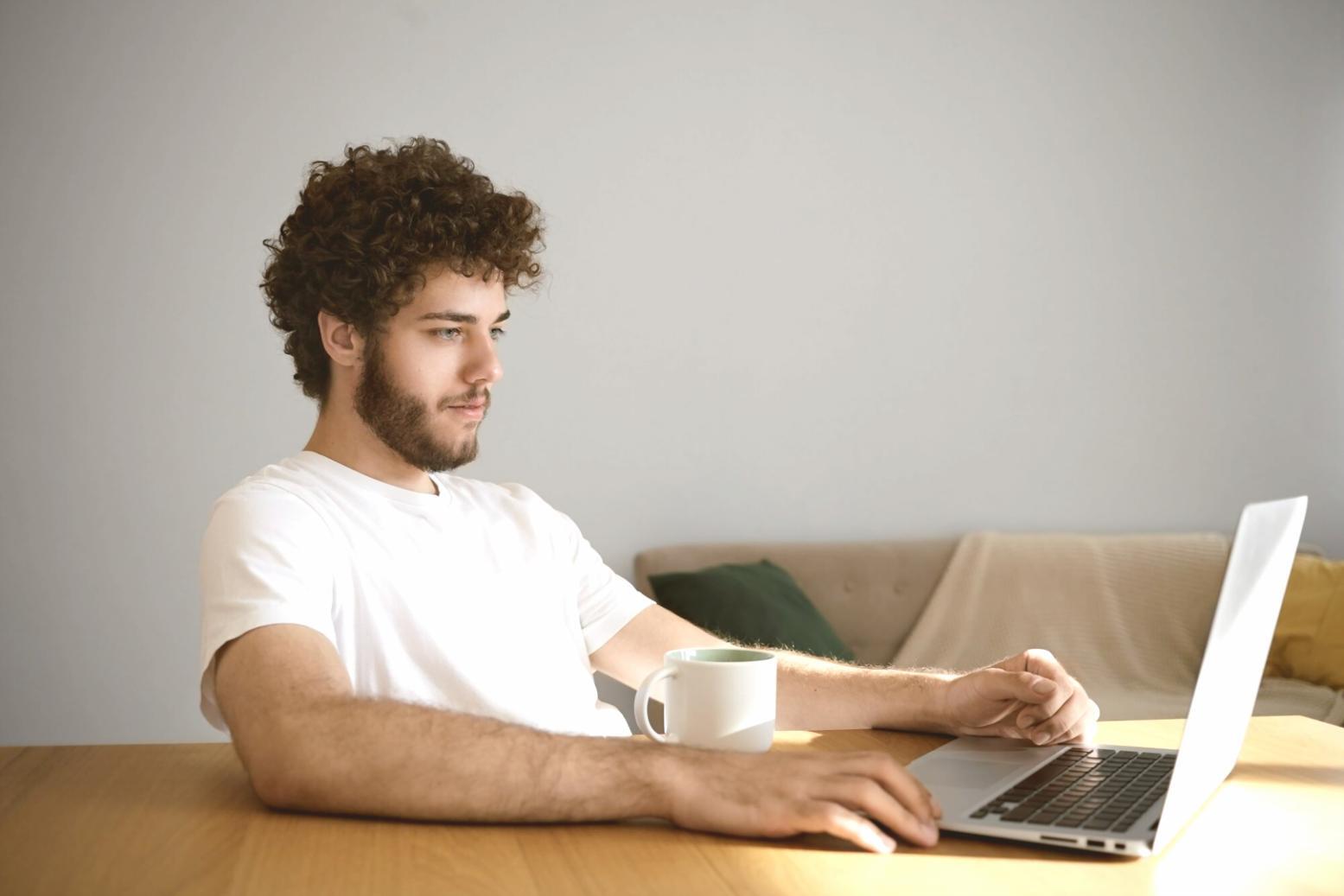 Business owner reviewing financial reports with confident expression